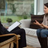therapist session with client on couches